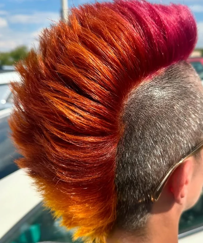 Flame-inspired orange, red and pink mohawk color by Stephanie Thomas at Gypsy Cosmo Salon